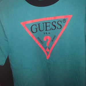 Guess tea shirt guys or girl.